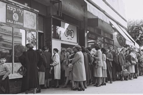 CITIZENS OF TEL AVIV STANDING IN LINE TO PURCHASE FOOD RATIONS AGAINST SPECIAL COUPONS IN TEL AVIV.